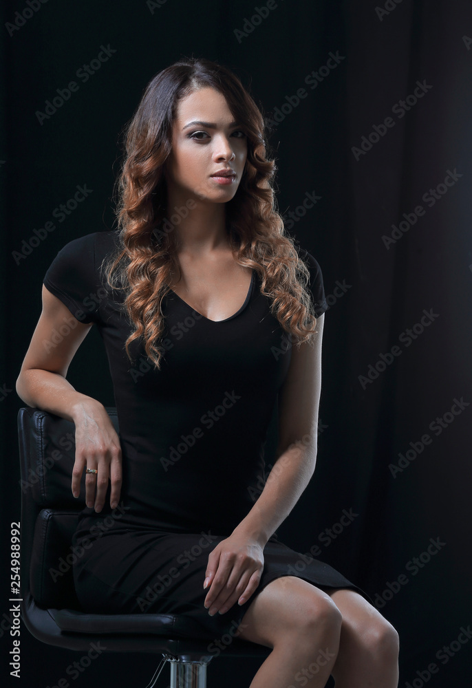 young gorgeous caucasian brunette in dress on chair young gorgeous caucasian brunette in dress on chair