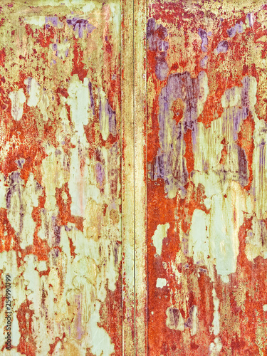 Rusty grunge background. Rough red and yellow metallic texture.
