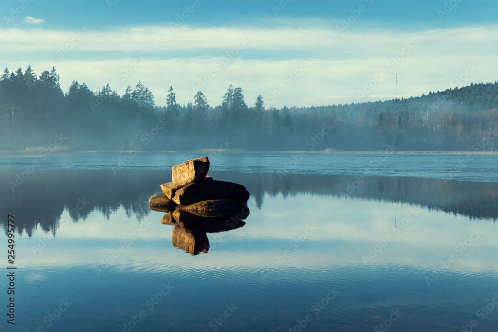 Sunset Light on Zen Stones in Lake. Empty Quiet Place with Forest on Background, Czech Republic, Europe.