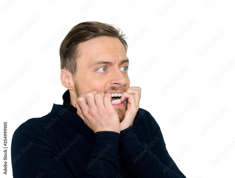 young man looking shocked and scared, isolated on white backgrou young man looking shocked and scared, isolated on white backgrou