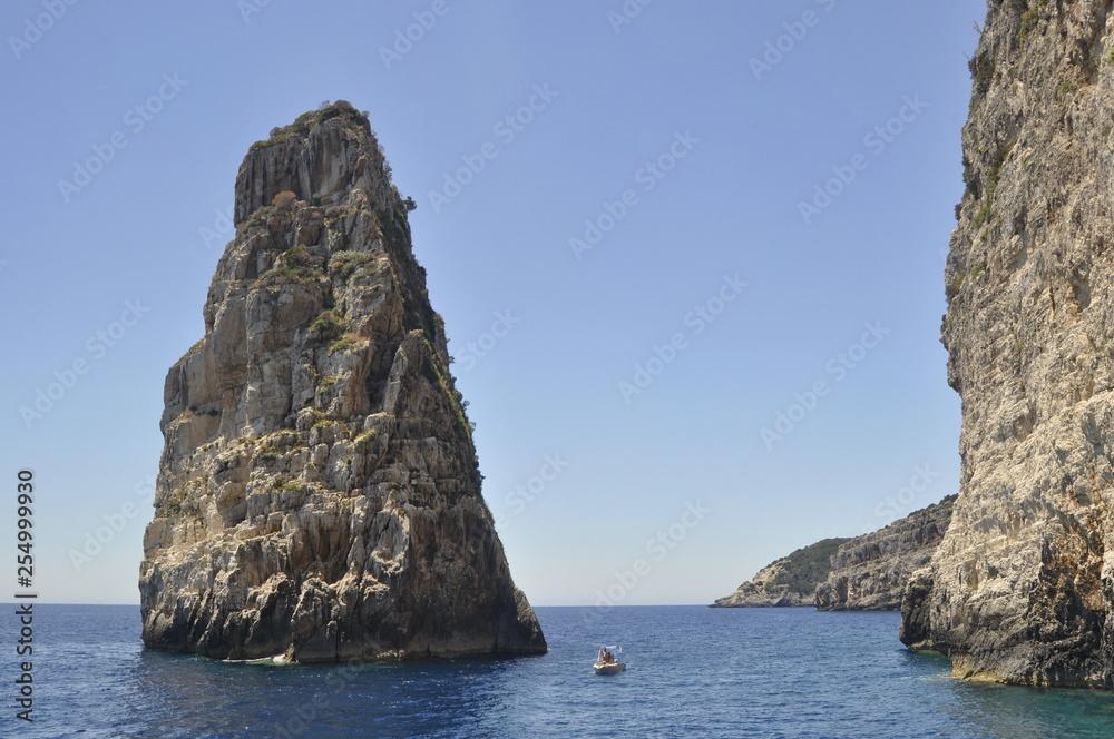 Rock in the sea near Paxos in Greece Rock in the sea near Paxos in Greece