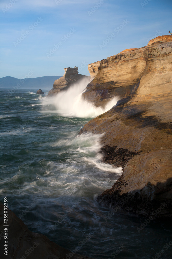 Coastal cliffs and waves