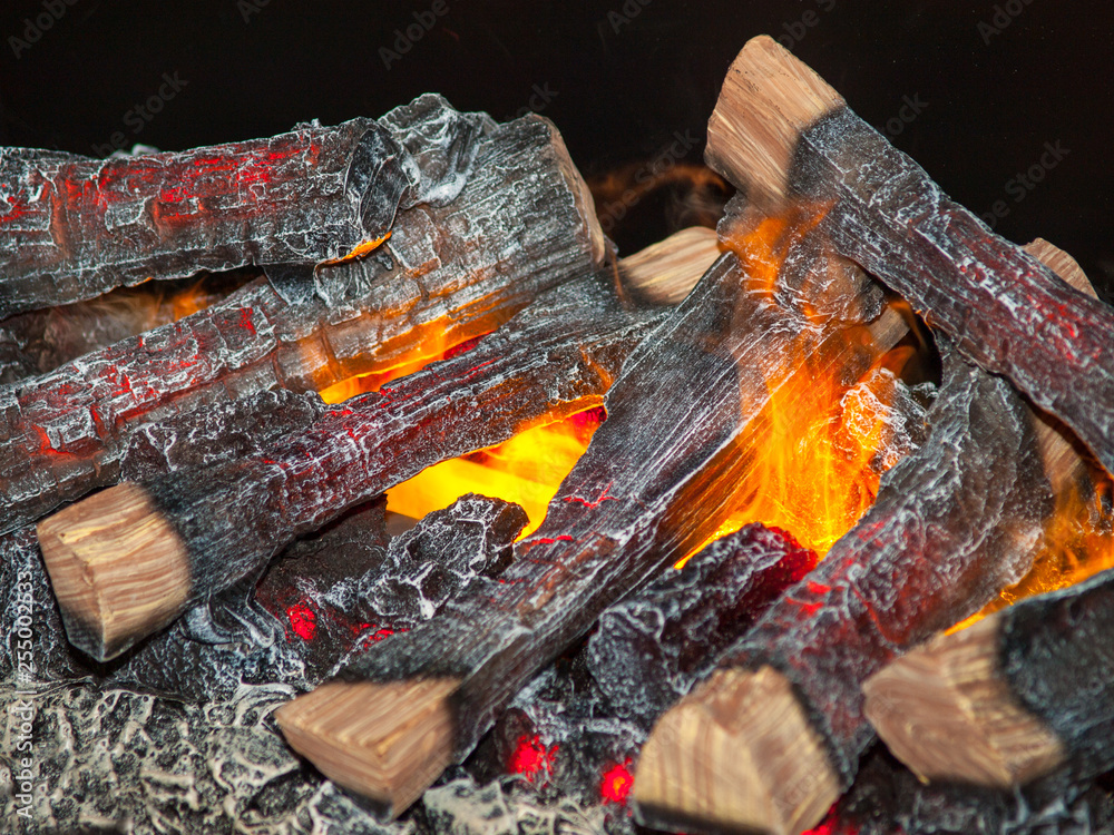Burning wood in a fire with strong heat Burning wood in a fire with strong heat