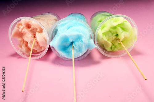 colorful cotton candy floss. sweet party food in pink and green