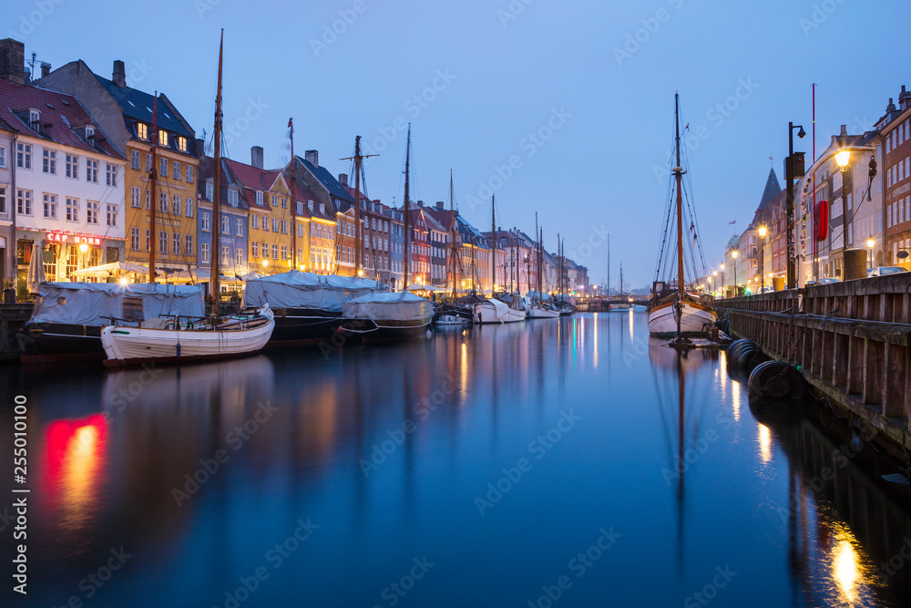 morning lights in blue twilight on canal Nyhavn in Copenhagen in Denmark 