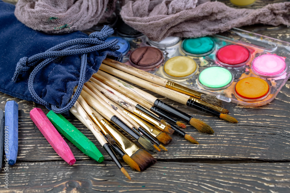 Paint brushes and paints for drawing. Paint brushes and paints for drawing.