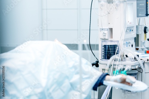 Patient lying in the operating room connected to a ventilator