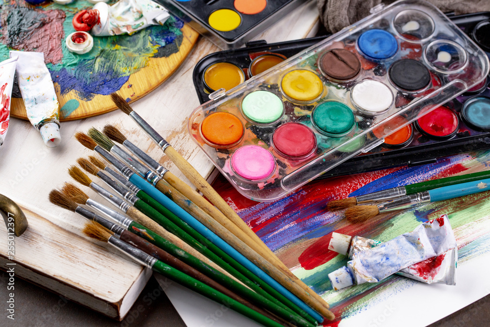 Paint brushes and paints for drawing. Paint brushes and paints for drawing.