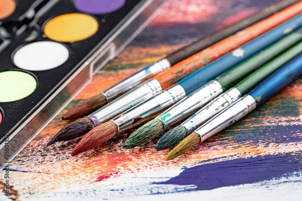 Fototapeta premium Paint brushes and paints for drawing.