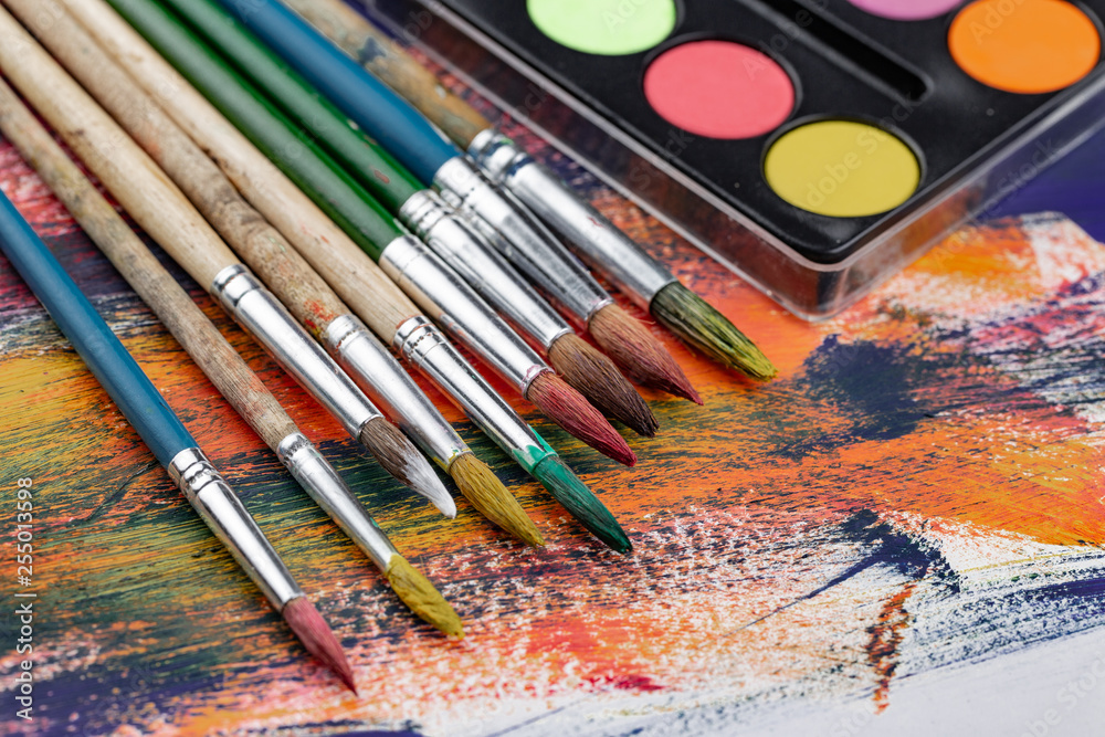 Fototapeta premium Paint brushes and paints for drawing.