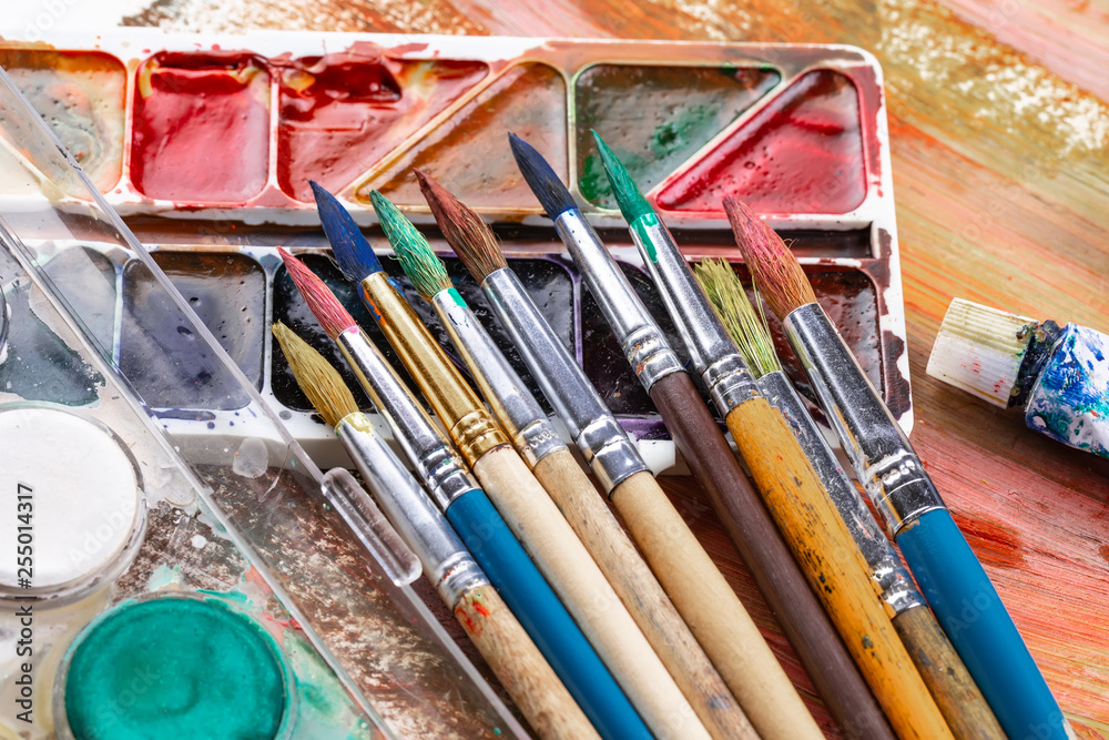 Fototapeta premium Paint brushes and paints for drawing.