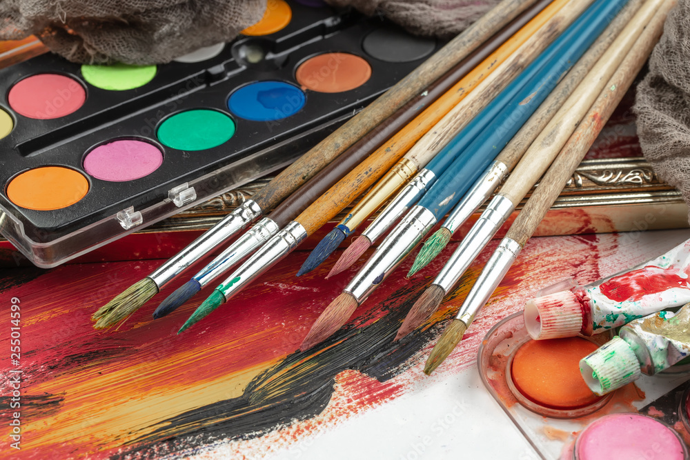 Paint brushes and paints for drawing. Paint brushes and paints for drawing.