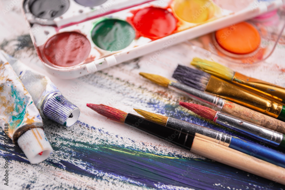 Fototapeta premium Paint brushes and paints for drawing.