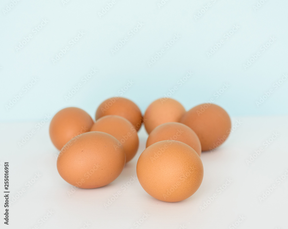 Fresh eggs in wicker basket on wood table Prepare chicken eggs and egg whisk for cooking or bakery can use for background or wallpaper. Fresh eggs in wicker basket on wood table Prepare chicken eggs and egg whisk for cooking or bakery can use for background or wallpaper.