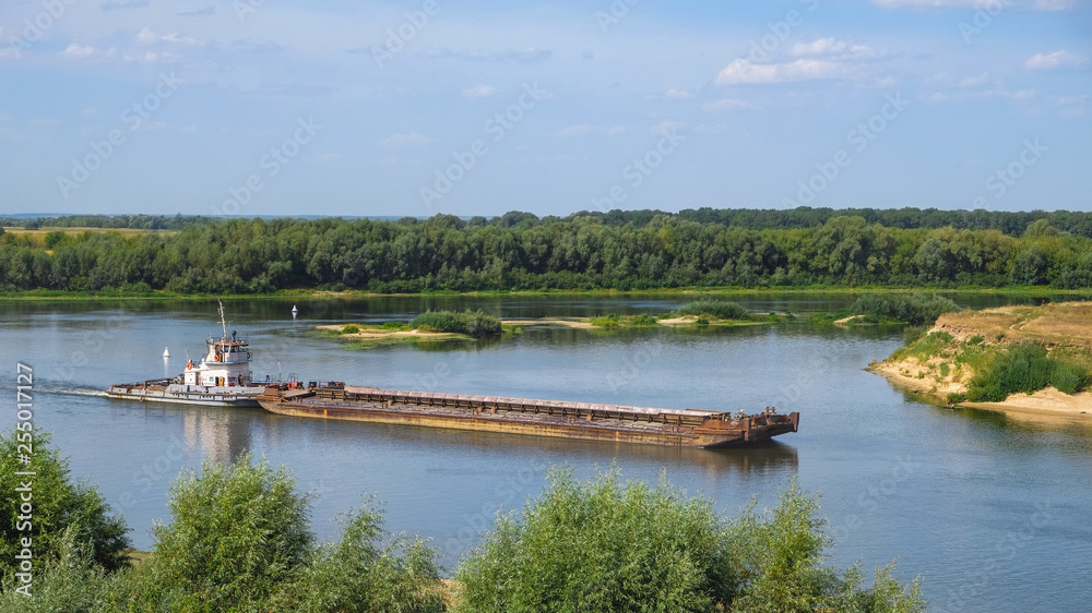 barge floating on the river