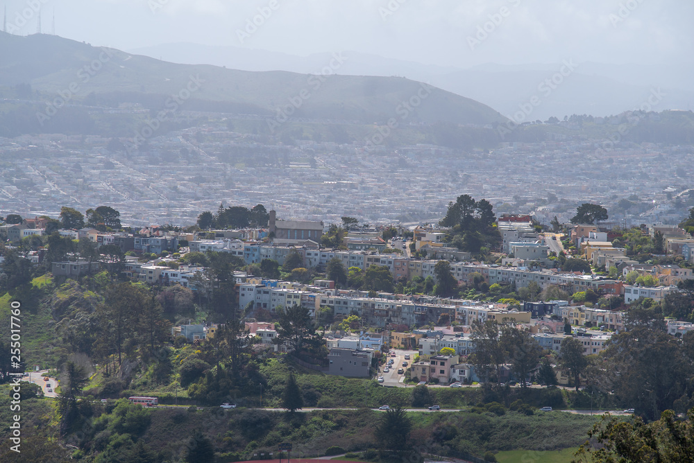 Townhouses on hills in San Francisco, closeup view from Twin Peaks