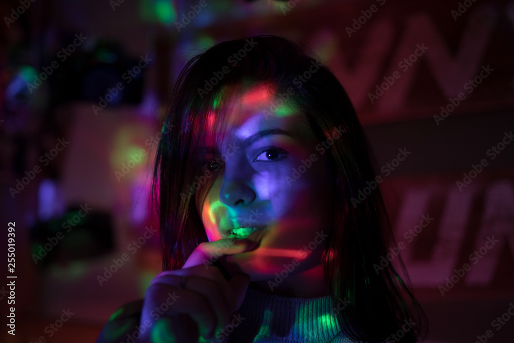 woman in black dress on street of city at night woman in black dress on street of city at night
