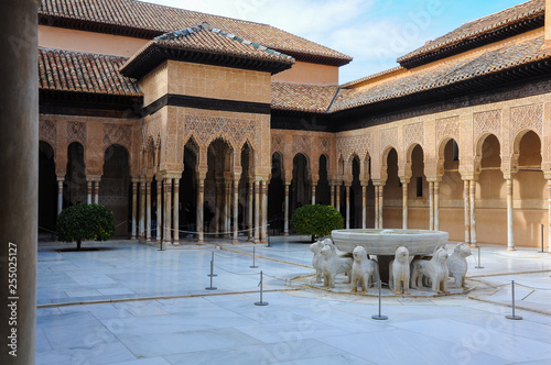 Court of the Lions, main courtyard of the Nasrid Palaces of the Alhambra in Granada, Spain