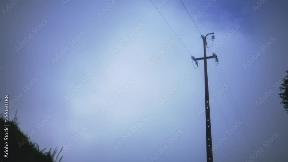 power lines in a mountain forest in dense fog power lines in a mountain forest in dense fog