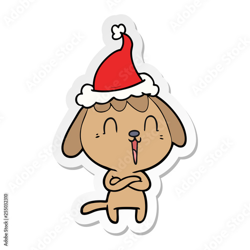 cute sticker cartoon of a dog wearing santa hat © lineartestpilot