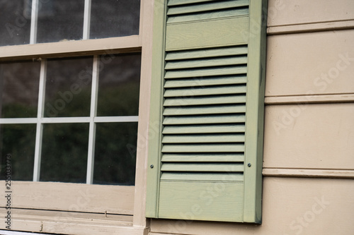 Faded shutters on the outside of a building © Stephen
