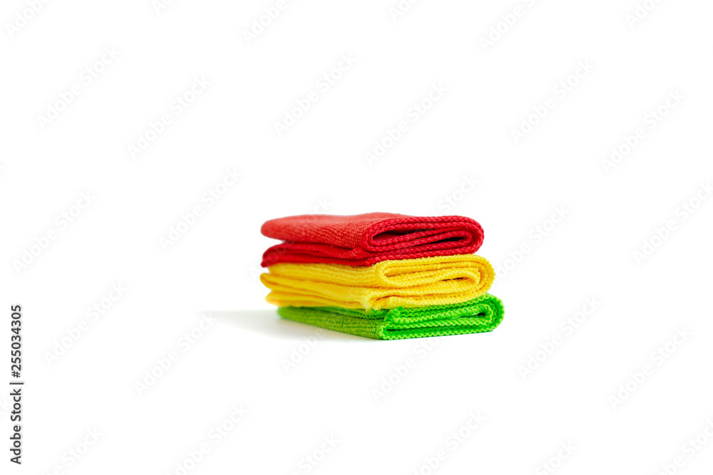 Microfiber towels stacked on top of each other. Isolated. Copy space. Microfiber towels stacked on top of each other. Isolated. Copy space.