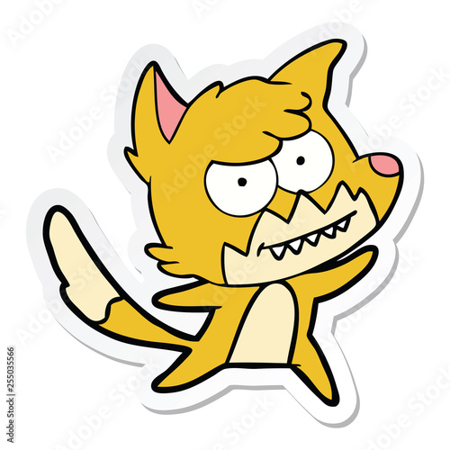 sticker of a cartoon grinning fox