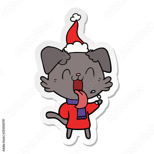 sticker cartoon of a panting dog wearing santa hat