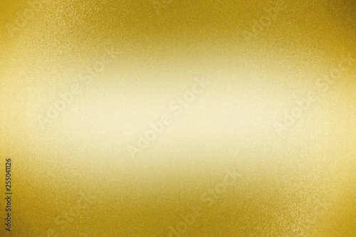 Shiny yellow steel wall, abstract texture background