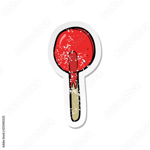 retro distressed sticker of a cartoon candy lolipop