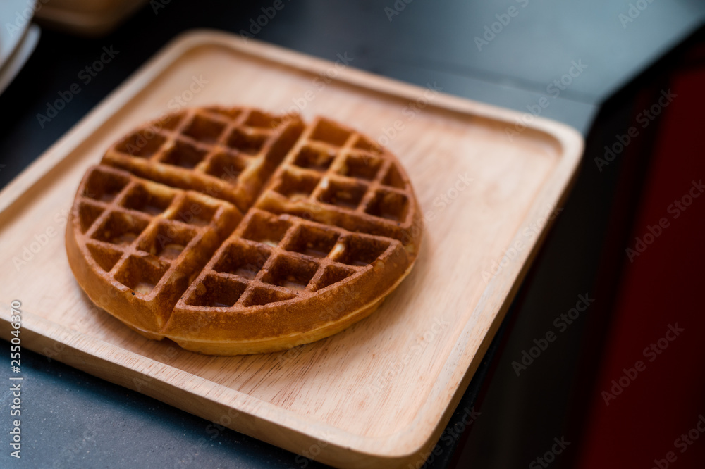 waffles on wooden plate