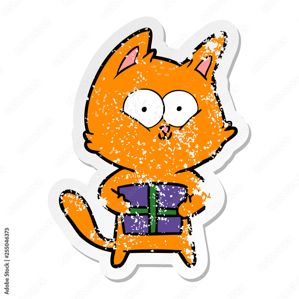 distressed sticker of a cartoon cat holding christmas present distressed sticker of a cartoon cat holding christmas present