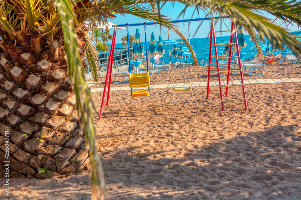 Fototapeta premium tropical beach with playground foe children