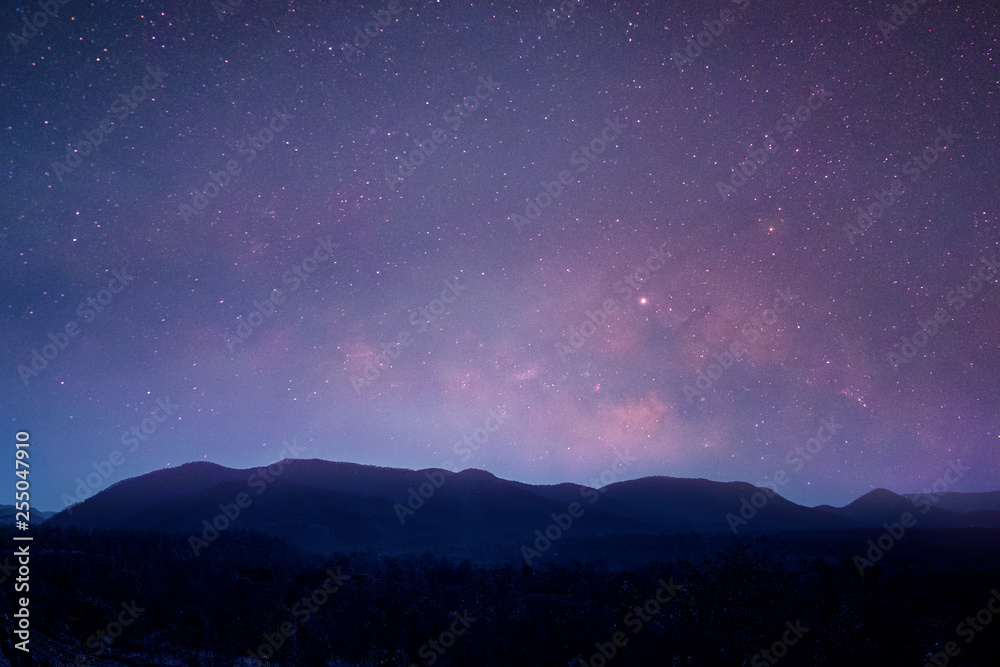 milky way,starry night landscape over mountion