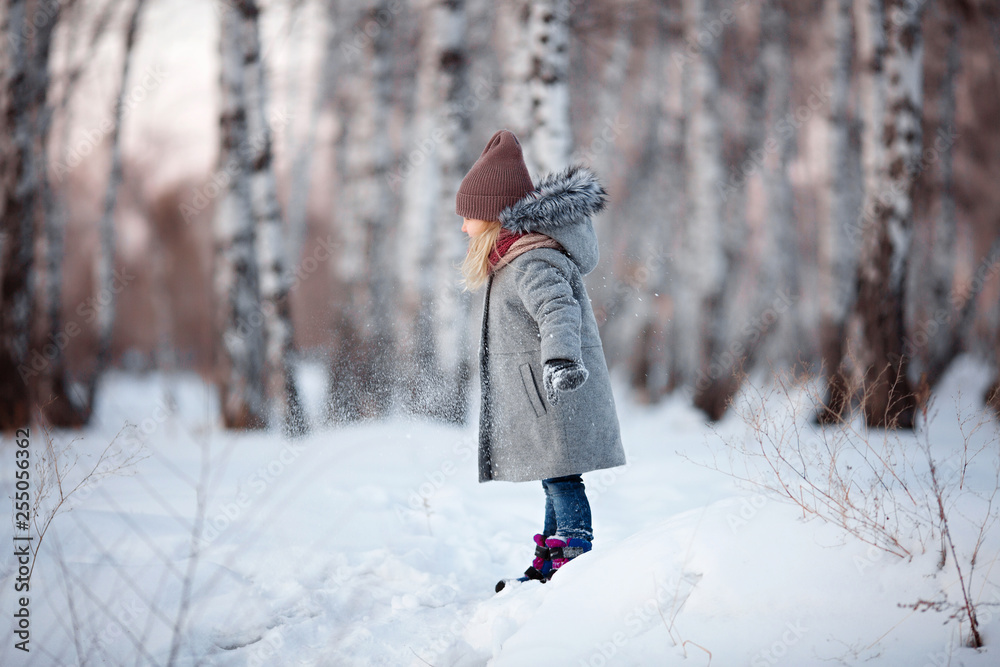 girl walking in the winter Park