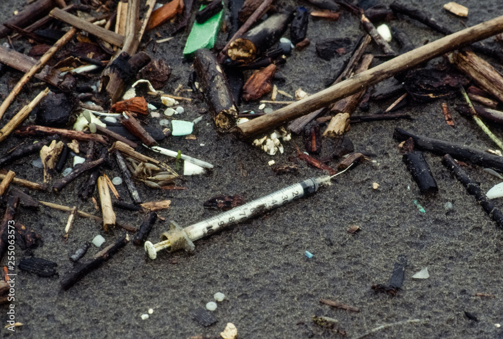 Medical Waste - Hypodermic needle found on the beach along with smalll pieces of plastic during the annual beach cleanup on the Oregon Coast. Medical Waste - Hypodermic needle found on the beach along with smalll pieces of plastic during the annual beach cleanup on the Oregon Coast.