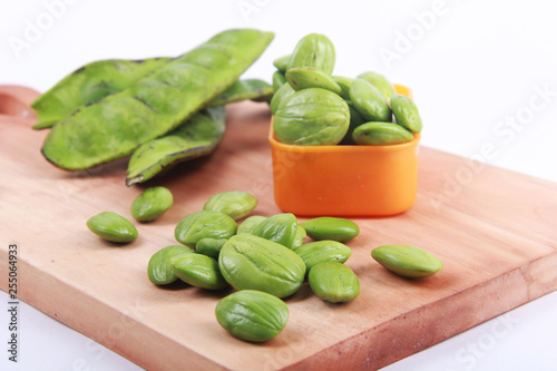 Parkia speciosa seeds or bitter bean on white background 