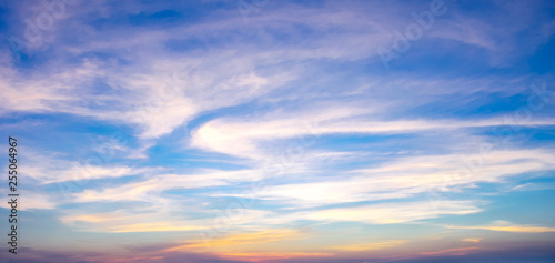 Blue sky background with white clouds At sunrise or sunset