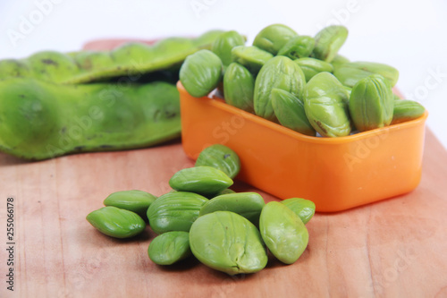 Parkia speciosa seeds or bitter bean on white background