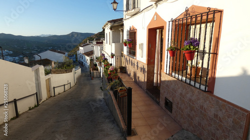 Steep street and front terrace in Andalusian village