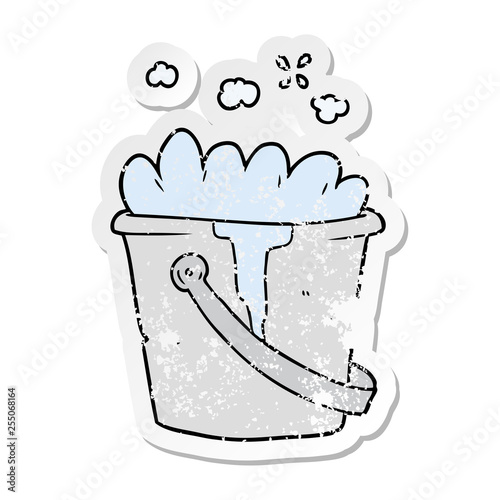 distressed sticker of a cartoon bucket of soapy water
