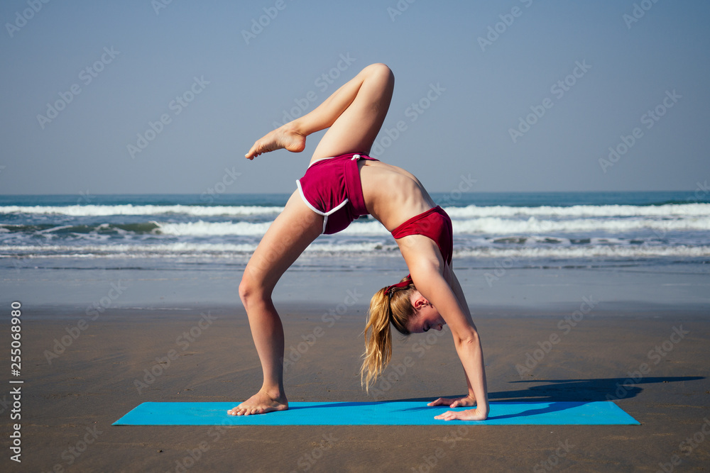 muladhara swadhisthana manipula tantra yoga on the beach woman