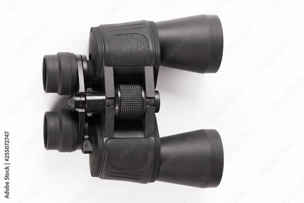Black binoculars isolated on white background Black binoculars isolated on white background