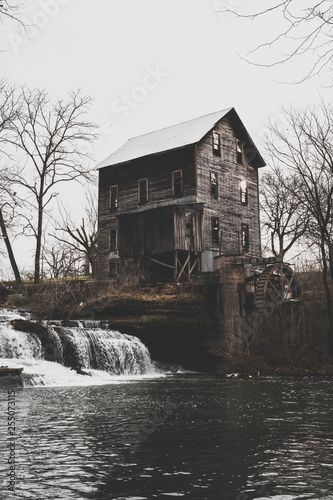Fototapeta gristmill with waterfall