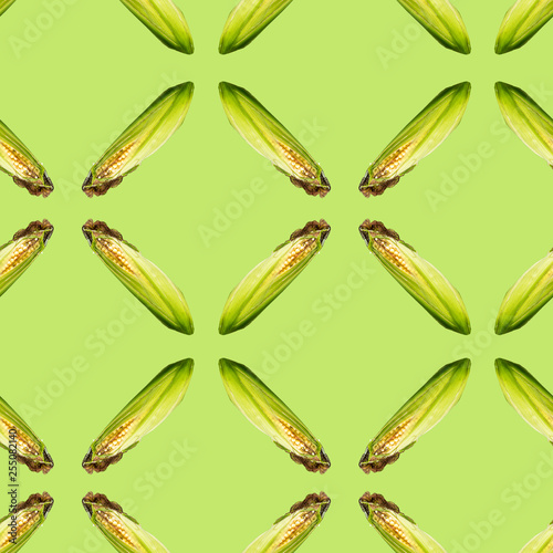 Raster cross seamless pattern. Ear of corn on green background. Site about agriculture, farm, livestock, graphics.