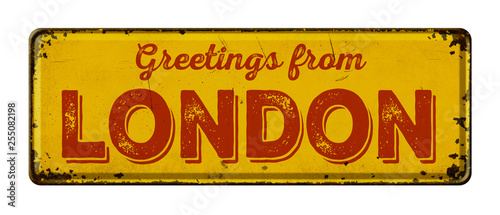 Photography Vintage metal sign on a white background - Greetings from London