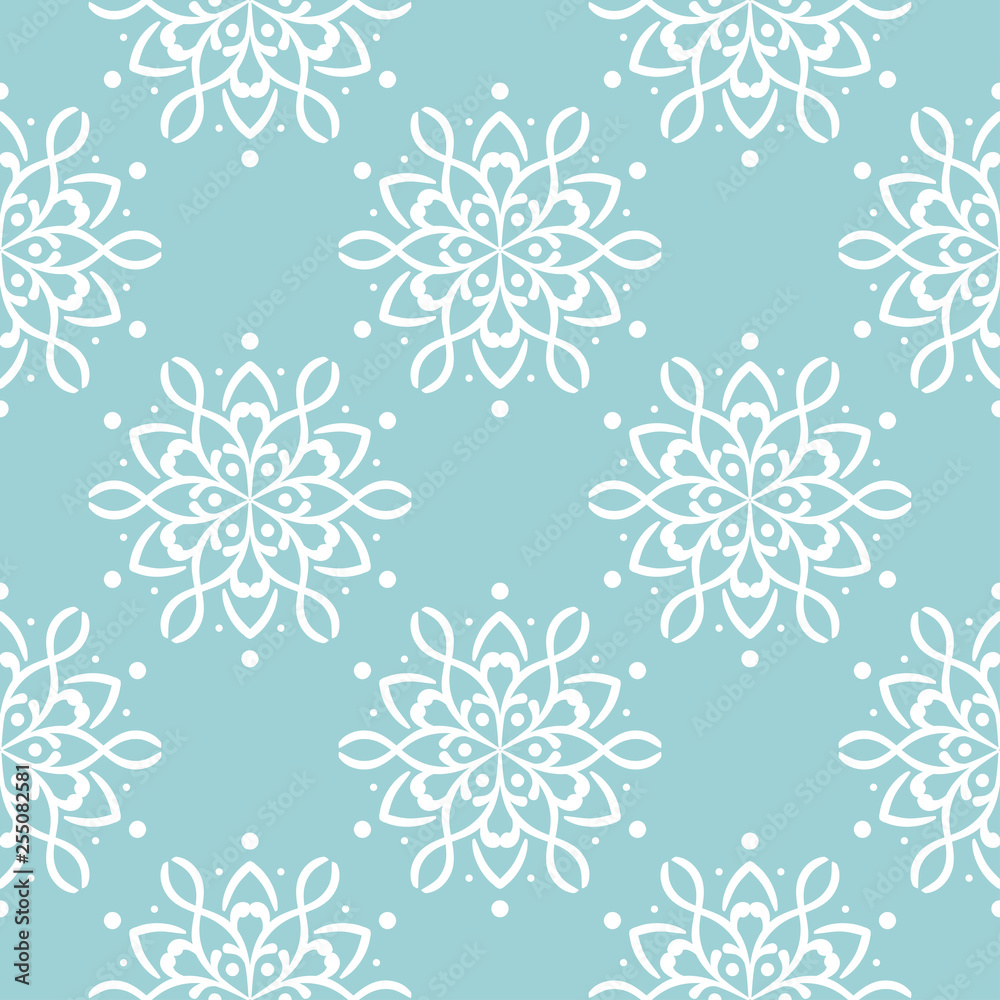 White floral design on blue seamless background White floral design on blue seamless background