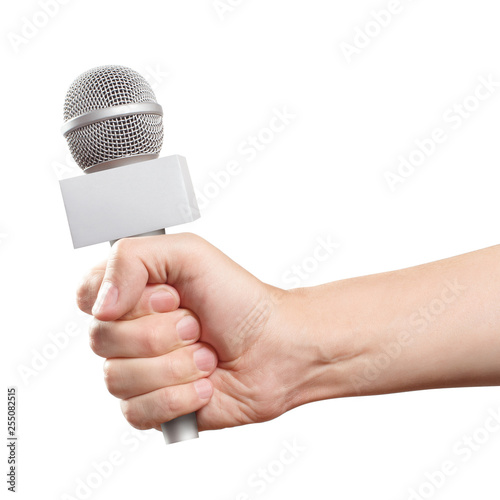 klein Doornen Aanwezigheid Stockfoto Hand of the news reporter holding a microphone, isolated on white  background | Adobe Stock