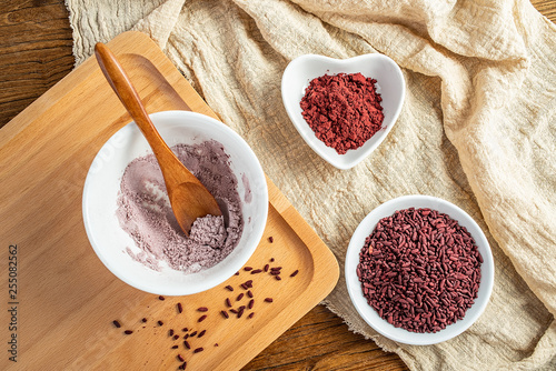 Chinese traditional natural pigment food red yeast rice and red yeast rice flour photo