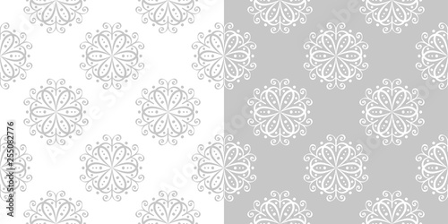 Floral seamless backgrounds. Gray and white compilation